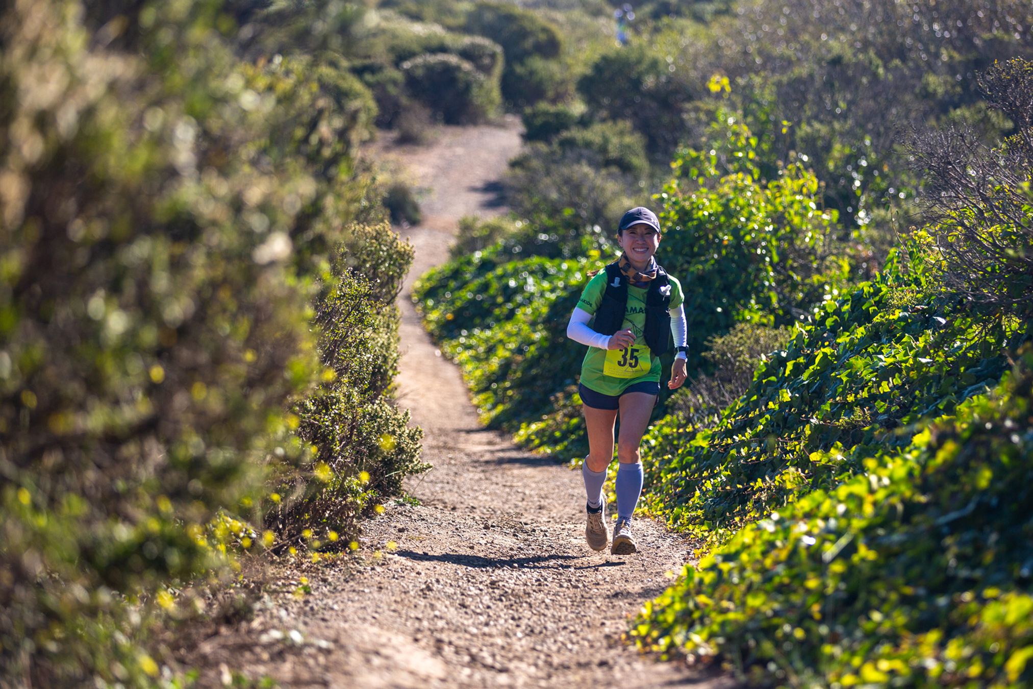 Trail runner on single-track at Star City Half